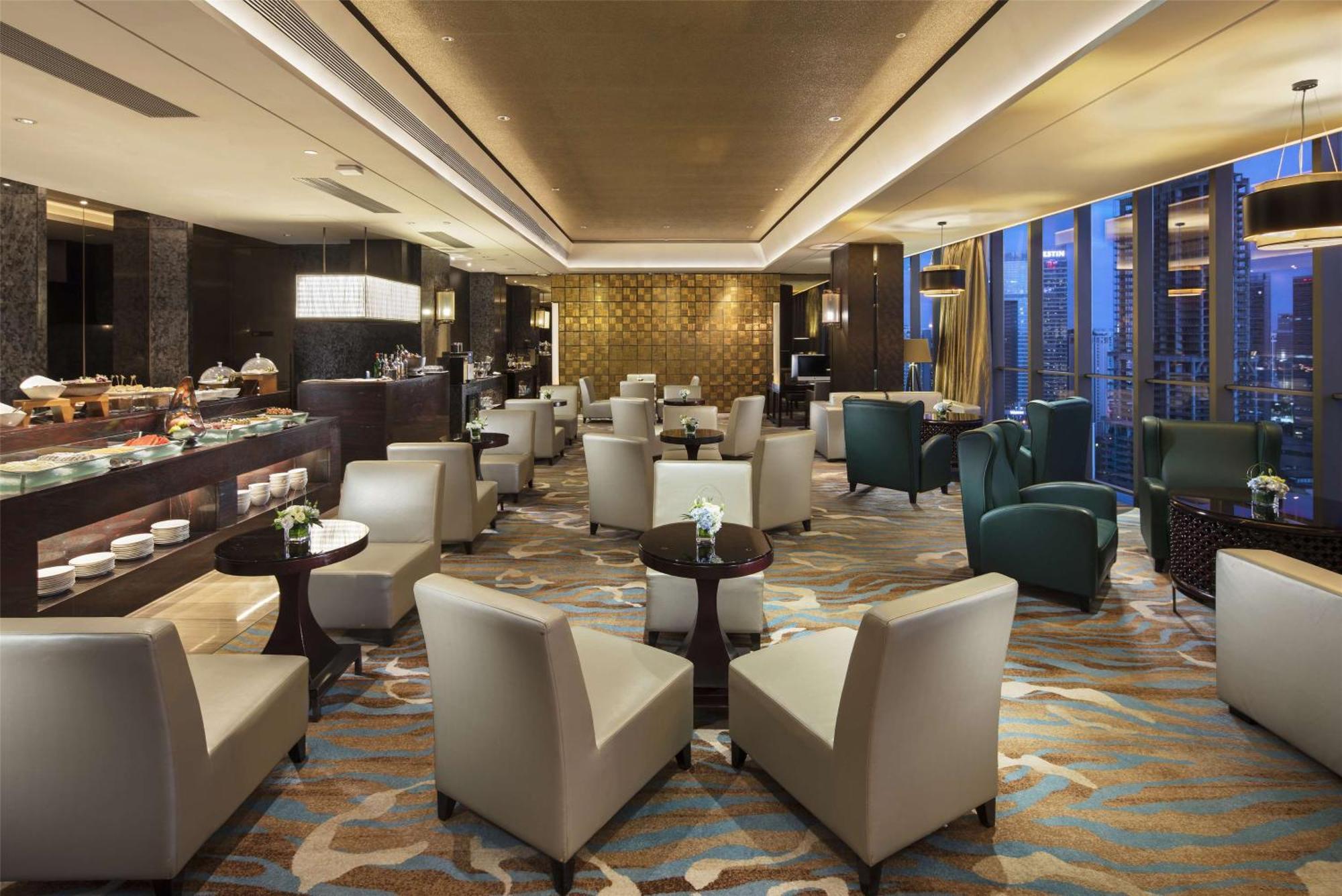 Hilton Guangzhou Tianhe - Free Shuttle Bus And Registration Counter Available During Canton Fair Period Zewnętrze zdjęcie The Club lounge at Beijing Capital International Airport