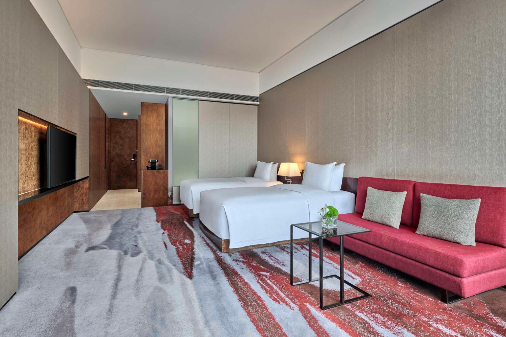 Hilton Guangzhou Tianhe - Free Shuttle Bus And Registration Counter Available During Canton Fair Period Zewnętrze zdjęcie